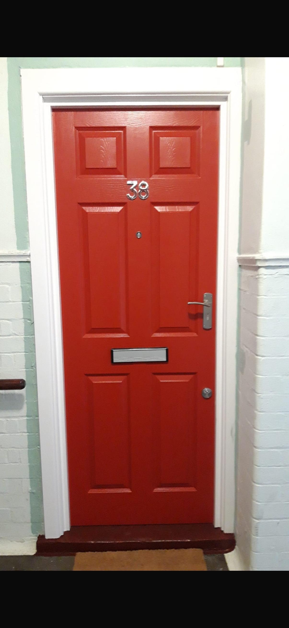 Red fire door number 38