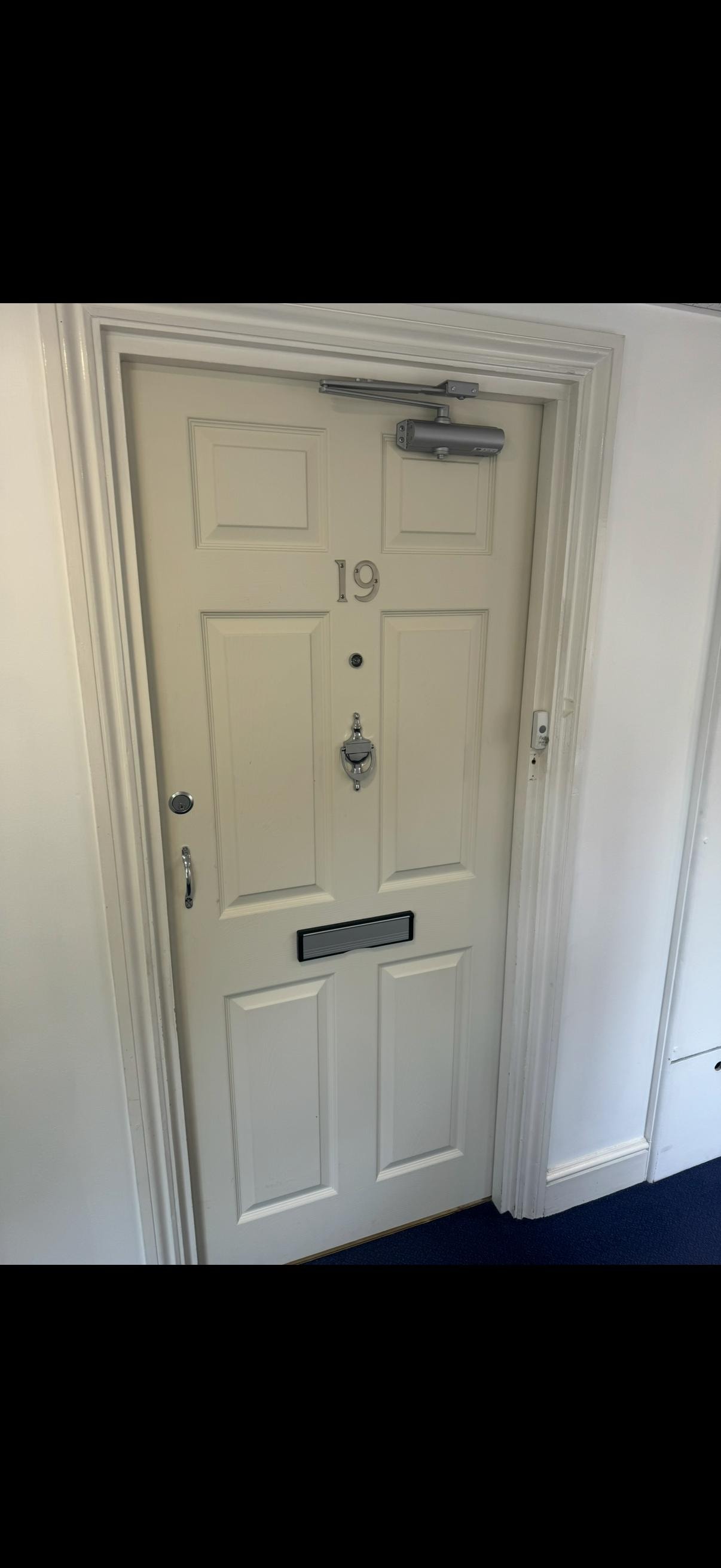 Cream coloured fire door number 19