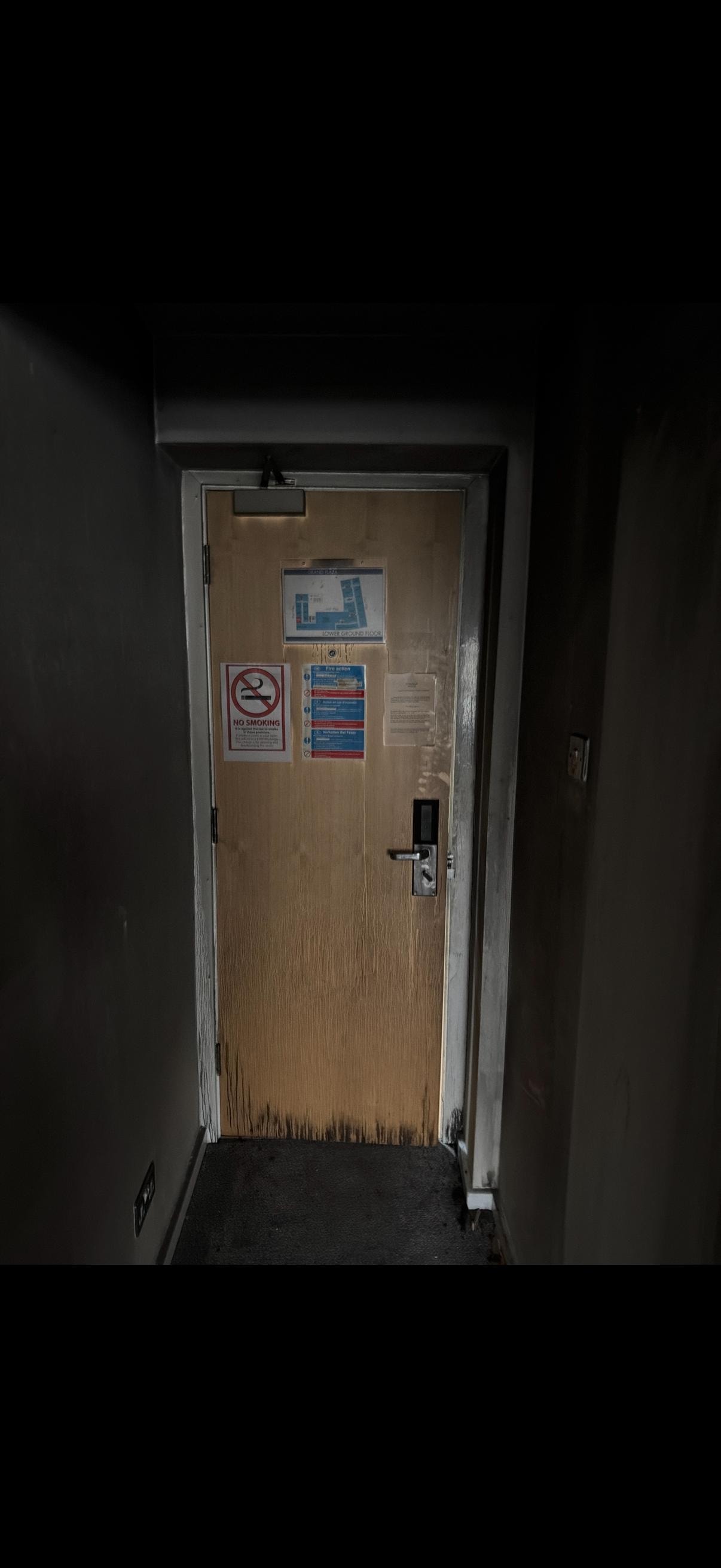 Room interior after fire — fire door contained the blaze to this room