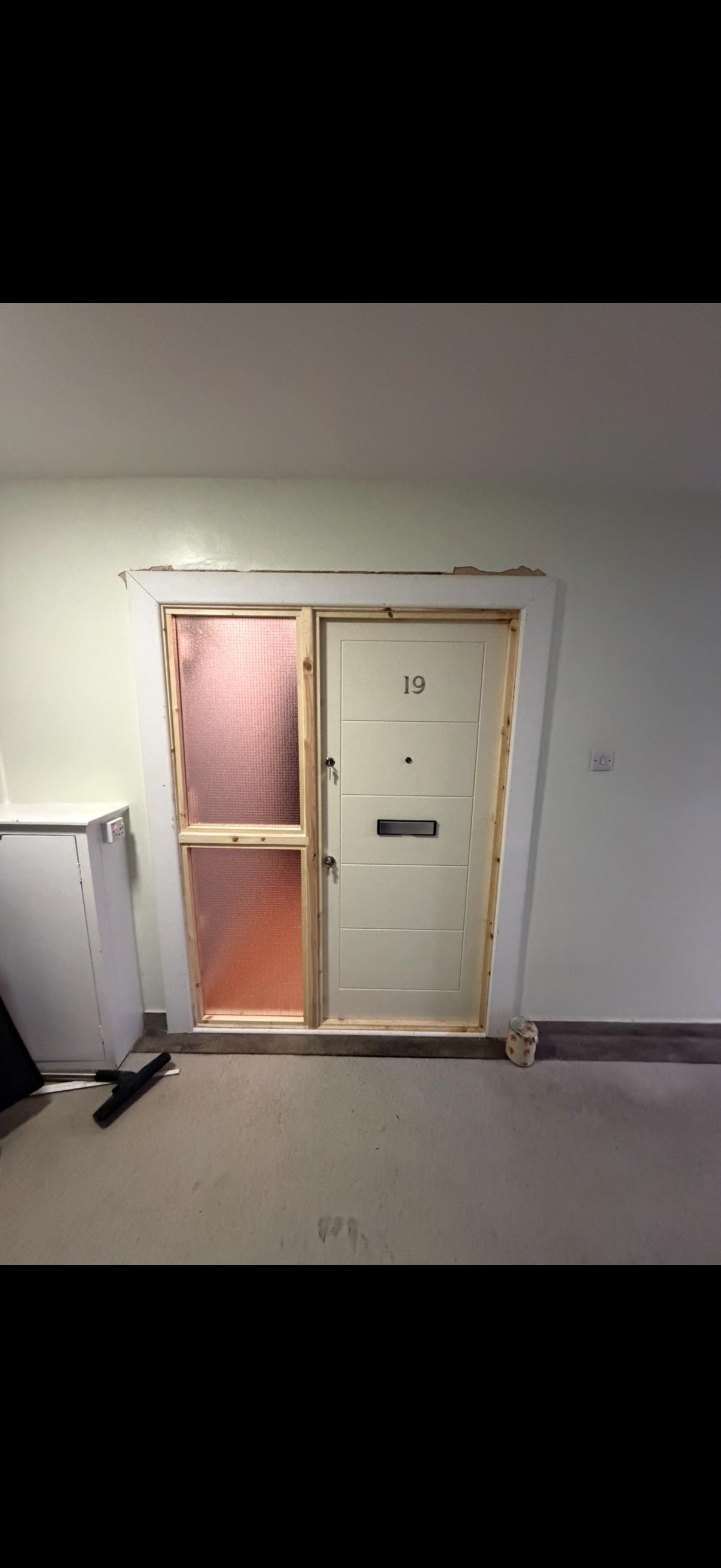 Bespoke fire door unit 19 with glazed sidelight panel finished