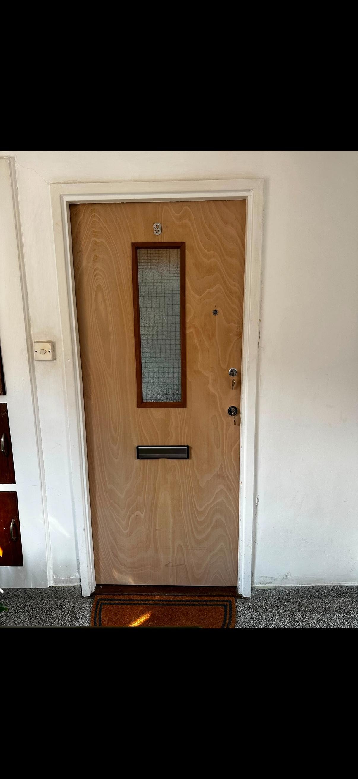 Wooden apartment fire door with window panel