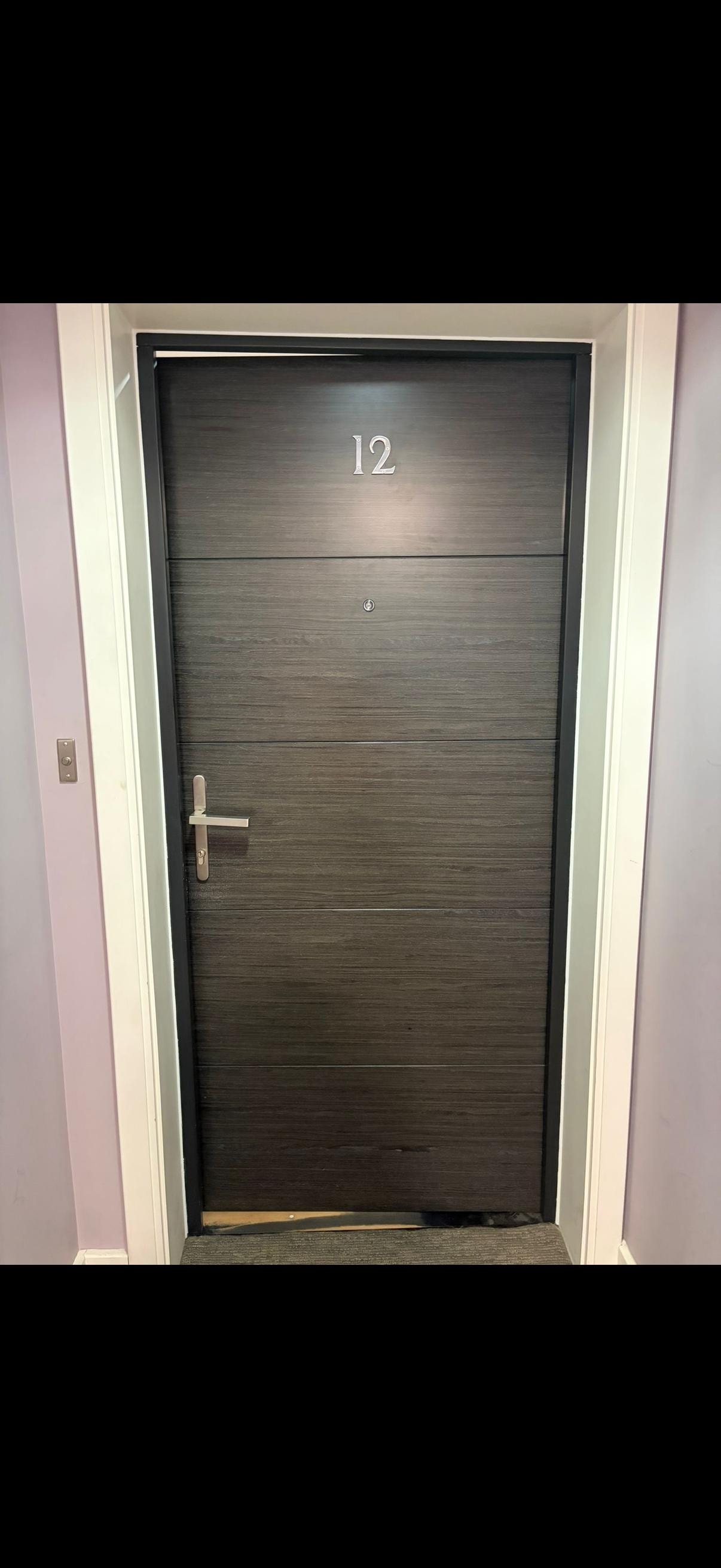 Dark apartment fire door number 12