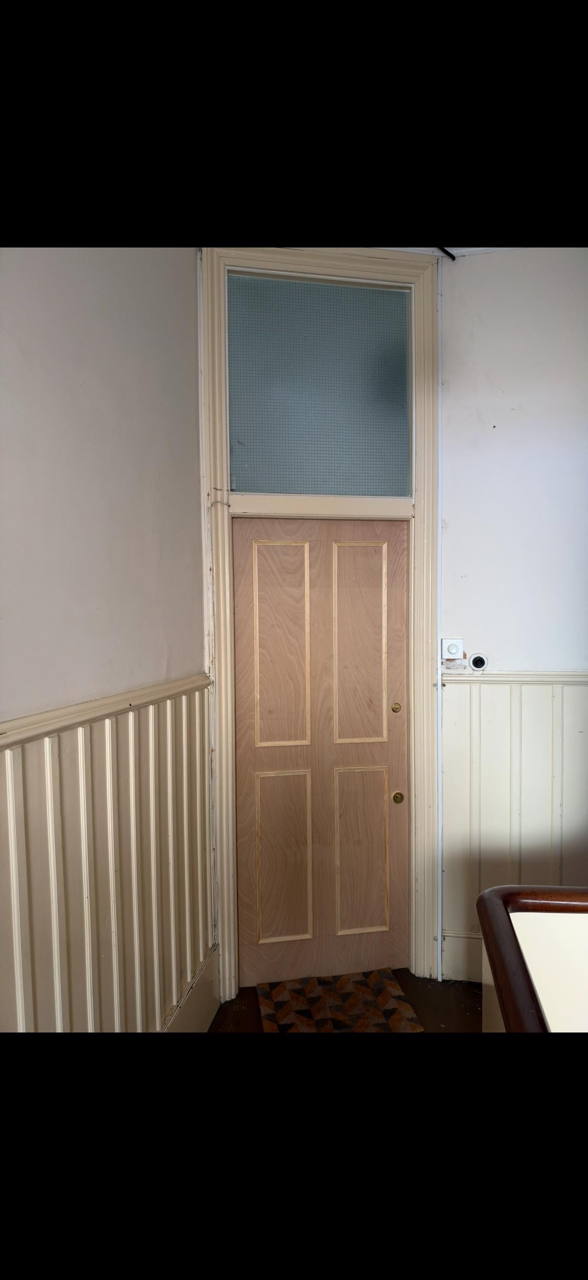 Fire door with glass panel interior